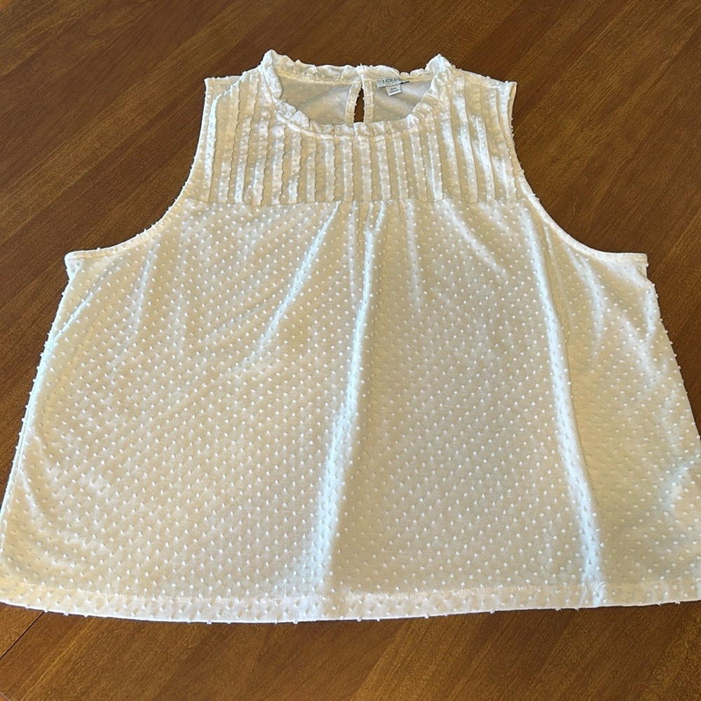 Cream sleeveless top